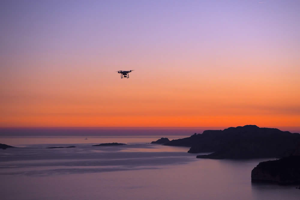 Drone in the Sunset. Get your for your Drone Training Course with 3iC